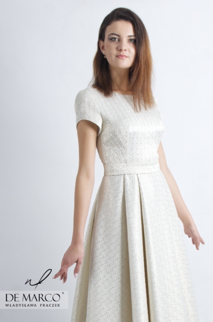 A unique dress from the designer with a jacket. A gold-colored visiting set. Flared midi dress