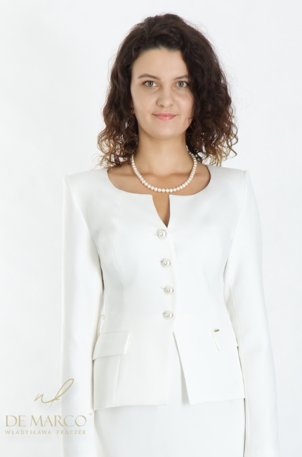 Fashionable white formal stylizations for the summer. White women's costumes and suits from the Polish manufacturer De Marco