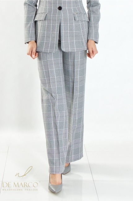 Luxury women's business pantsuit check. Fashionable jackets with trousers from Polish designer Władysława Frączek De Marco